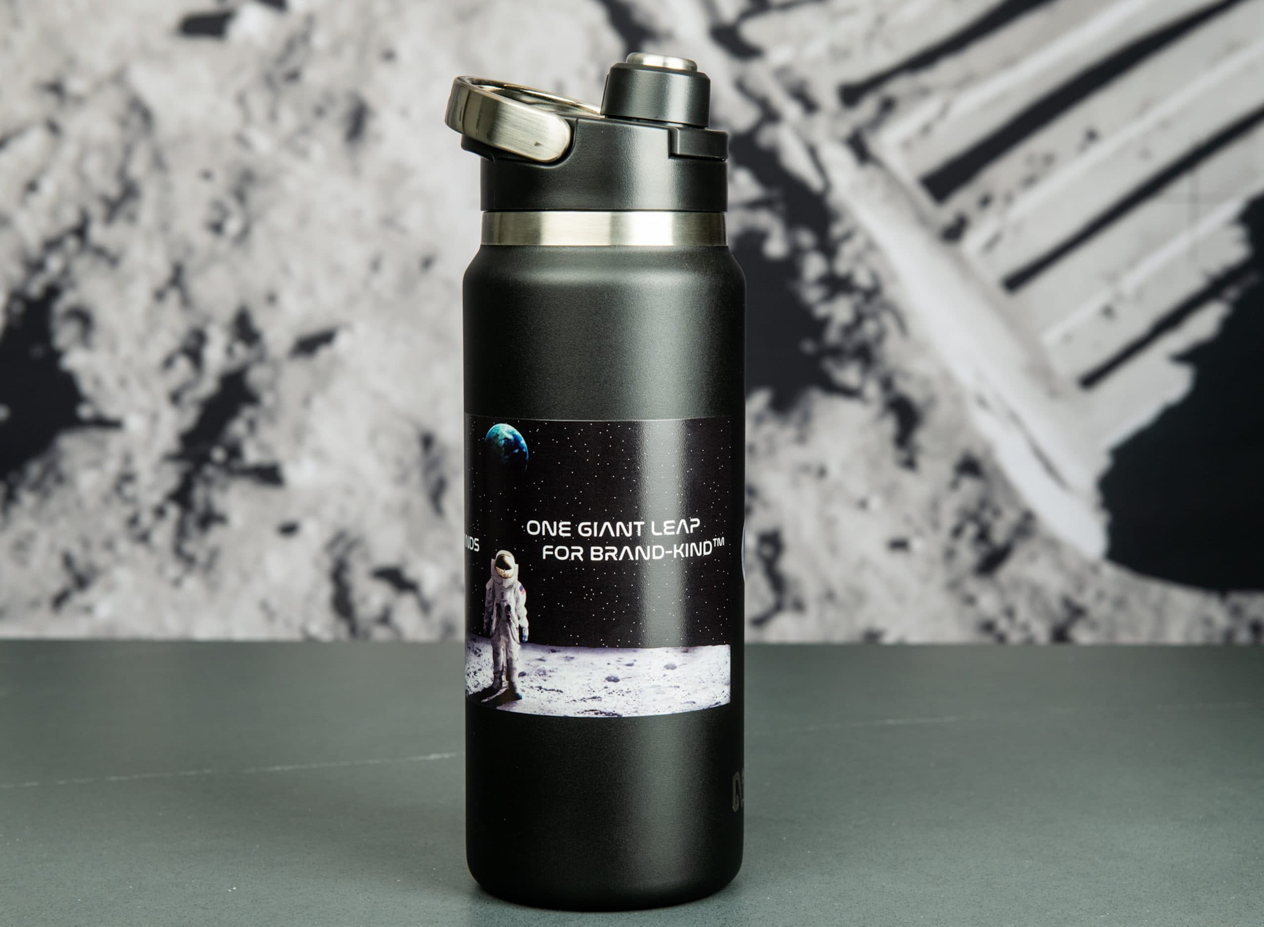 Custom-branded water bottle with space-themed design